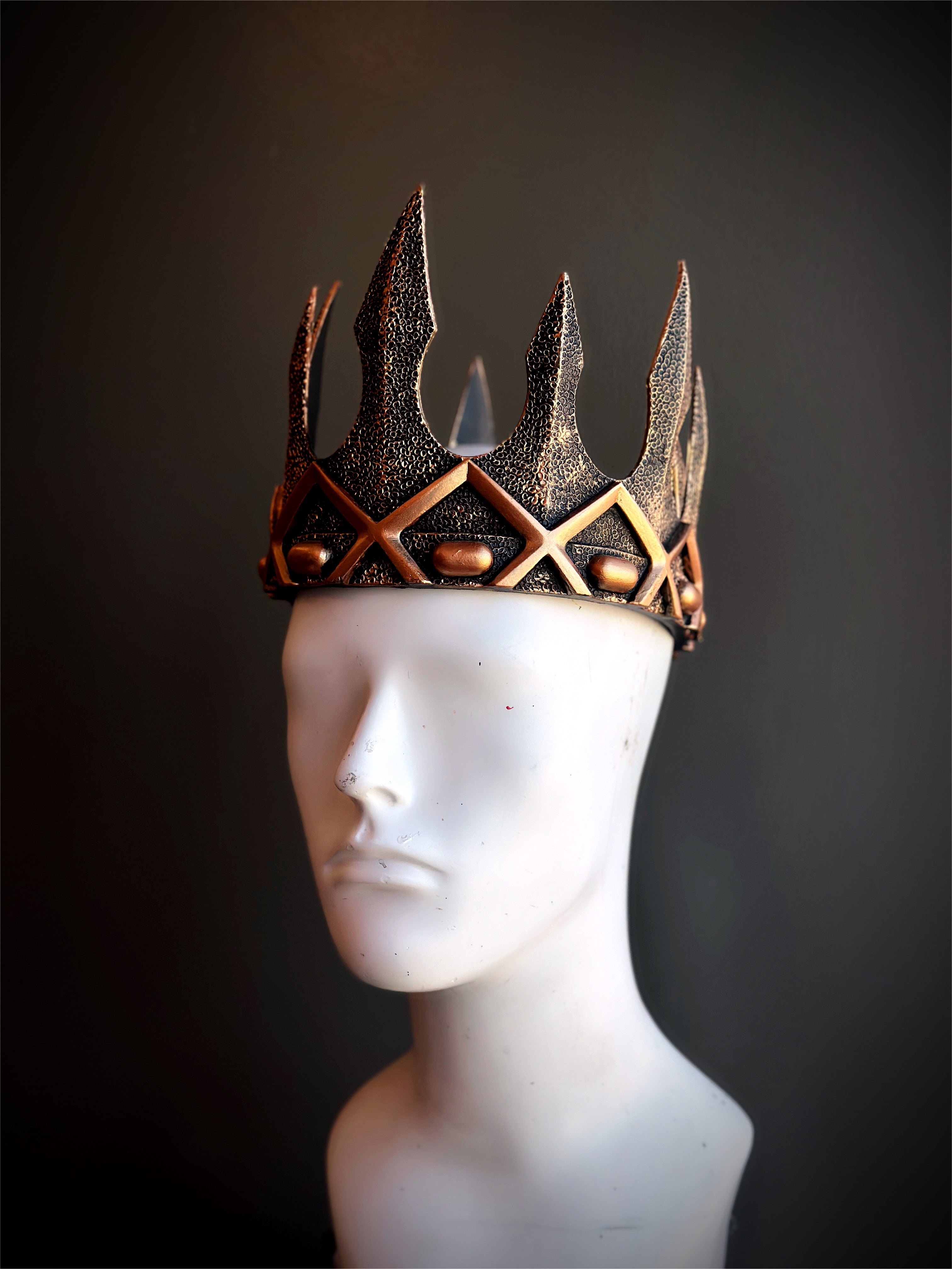 Gold royal crown with intricate detailing, inspired by medieval kings