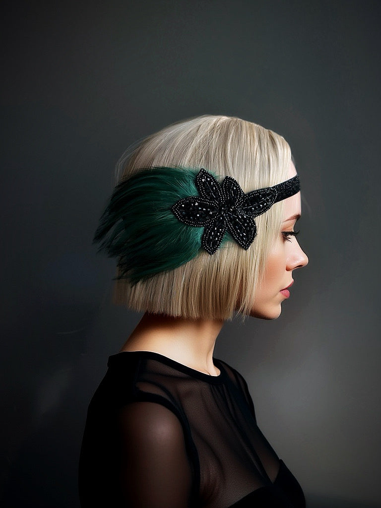 Green and black flapper headband with feathers and a beaded floral design, perfect for Gatsby-themed events and formal occasions.