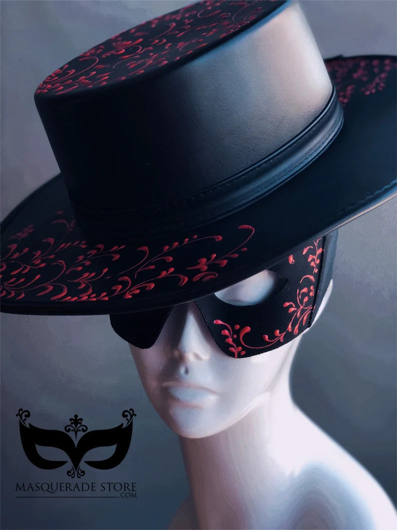 Black and blue plague doctor mask with ornate scroll detailing and top hat for gothic masquerade or cosplay.