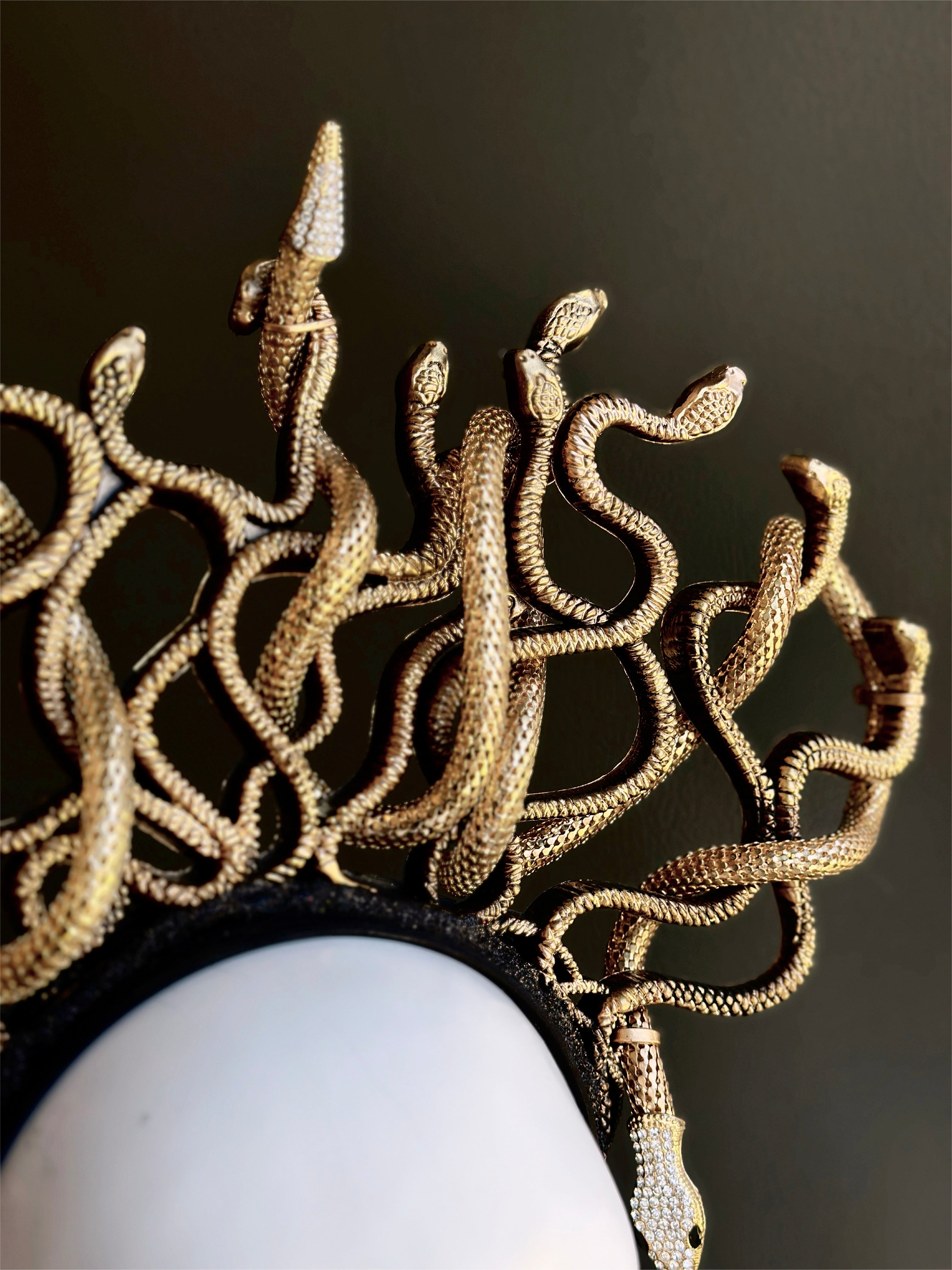 Handcrafted golden Medusa crown with elaborate serpent design for fantasy and mythic wear
