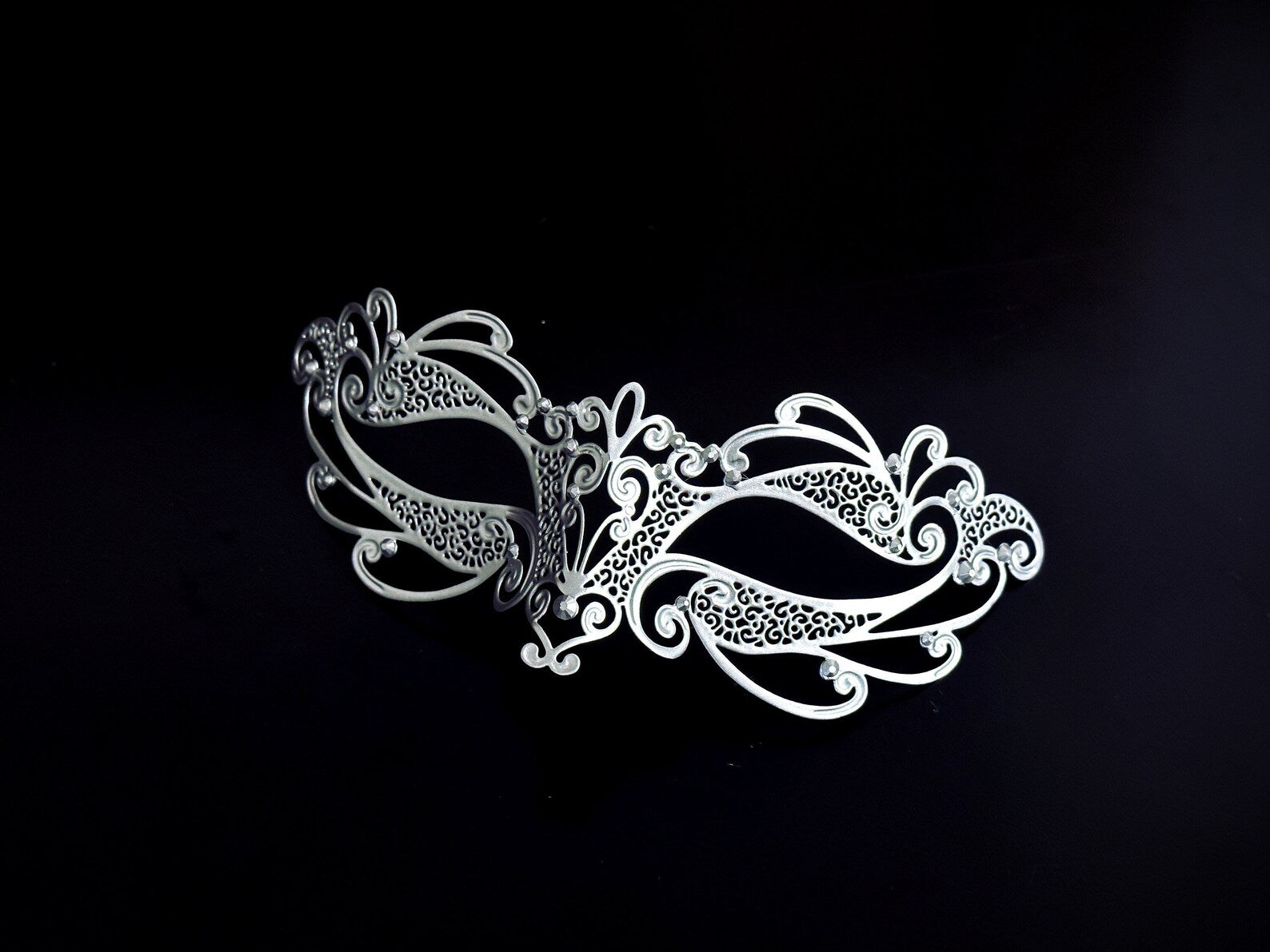 Kids silver metal masquerade mask with intricate cutout designs, perfect for costume parties and themed events.