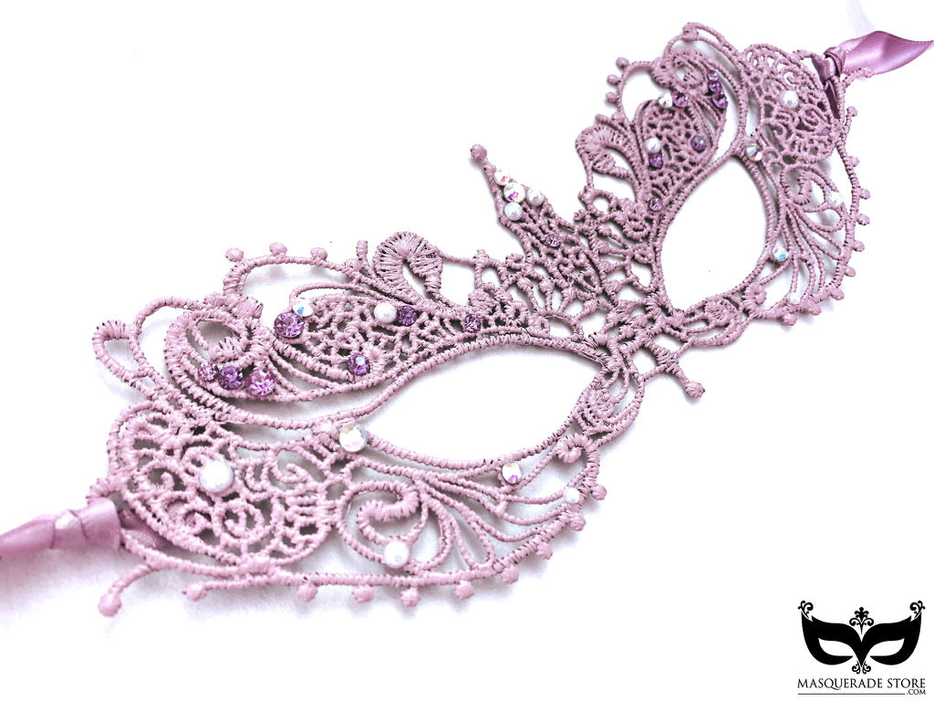 Lavender lace mask featuring intricate patterns and rhinestone embellishments, ideal for weddings and formal occasions.