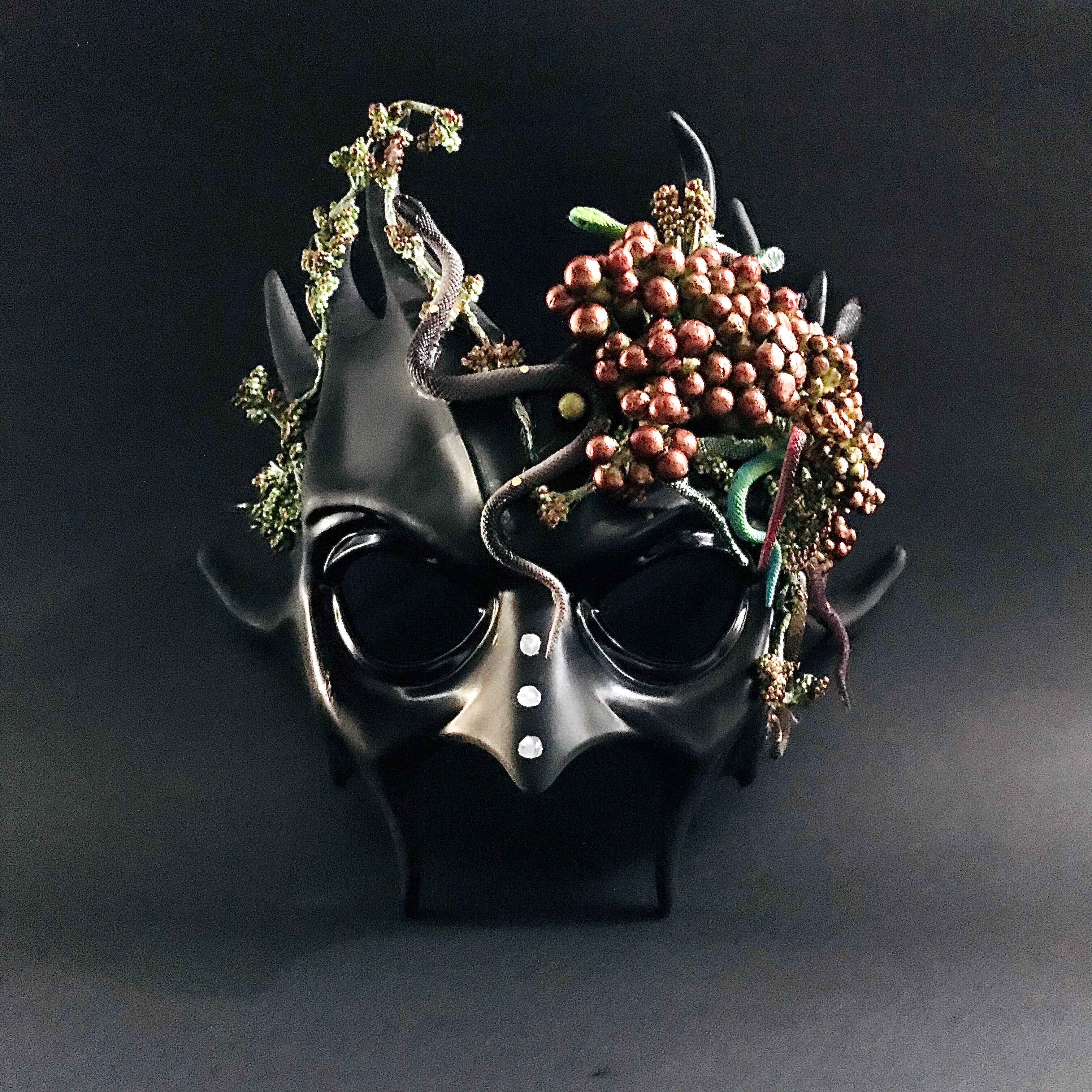 Bacchus masquerade mask adorned with vines and grape clusters