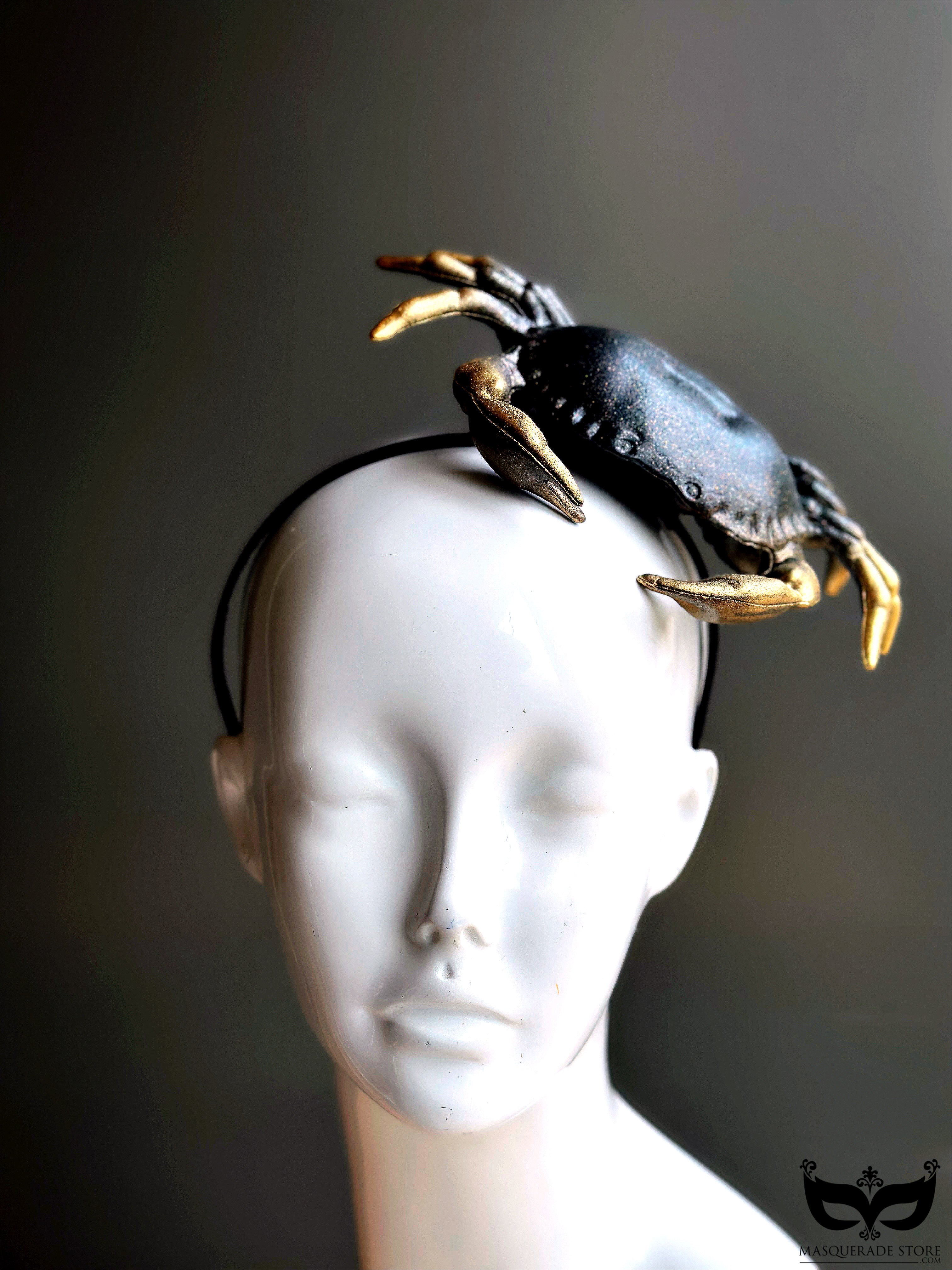 Unique black and gold crab headpiece on a sleek headband, perfect for ocean-inspired fashion, themed parties, and statement looks.