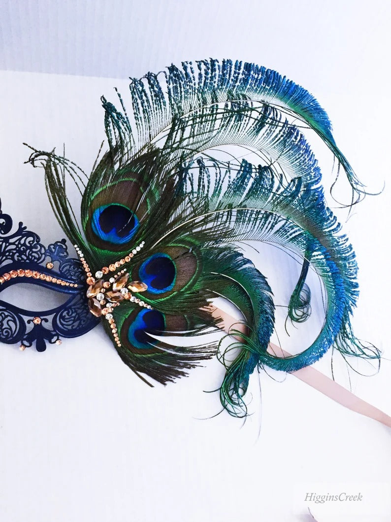 Elegant navy masquerade mask with peacock feathers and rhinestones, Venetian-style mask for women’s parties.