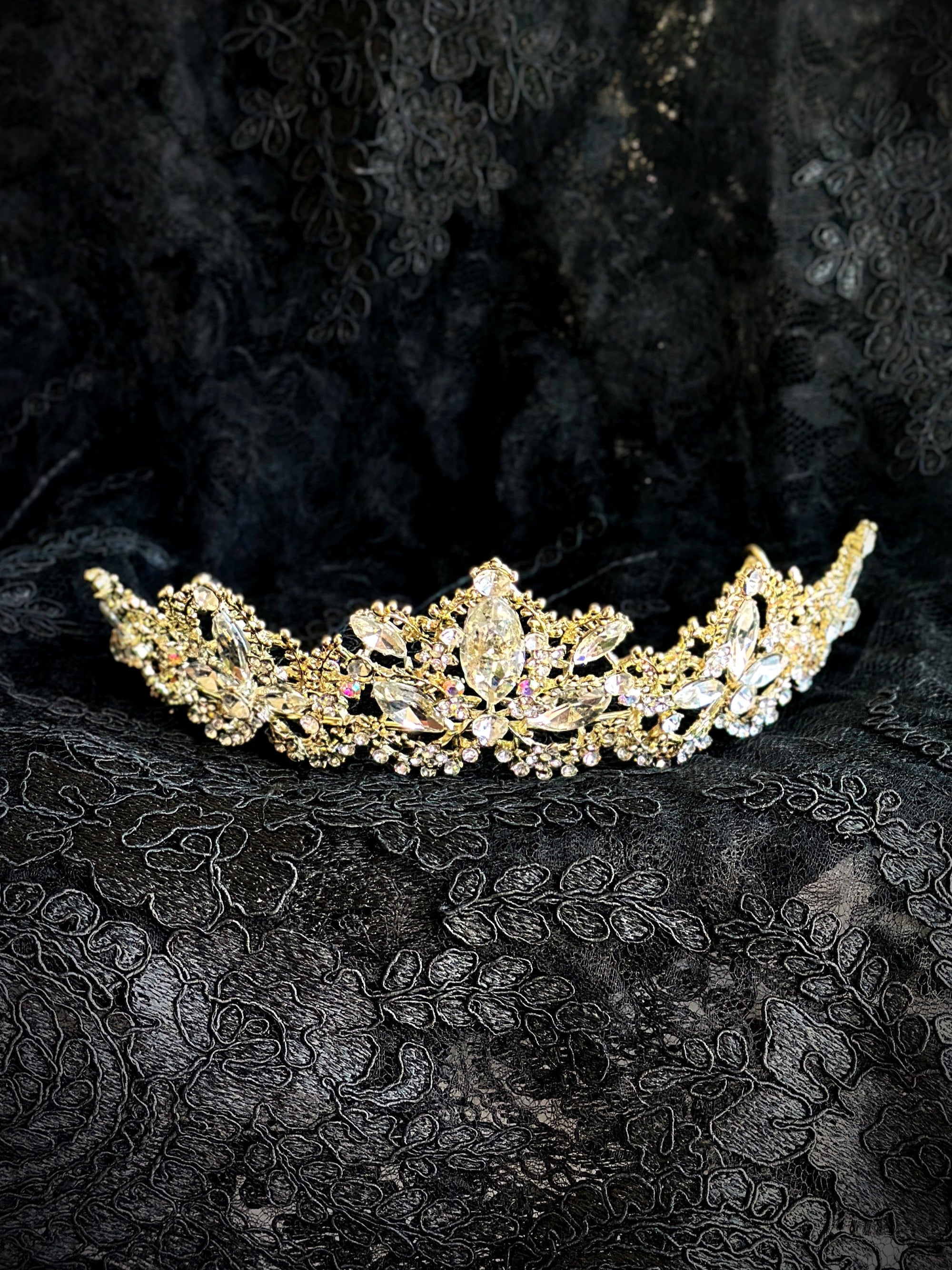 Gold floral crown with opal-like crystals and sparkling rhinestones.