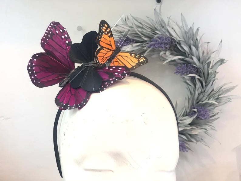 Monarch butterfly headband with purple and orange accents for cosplay and festivals.