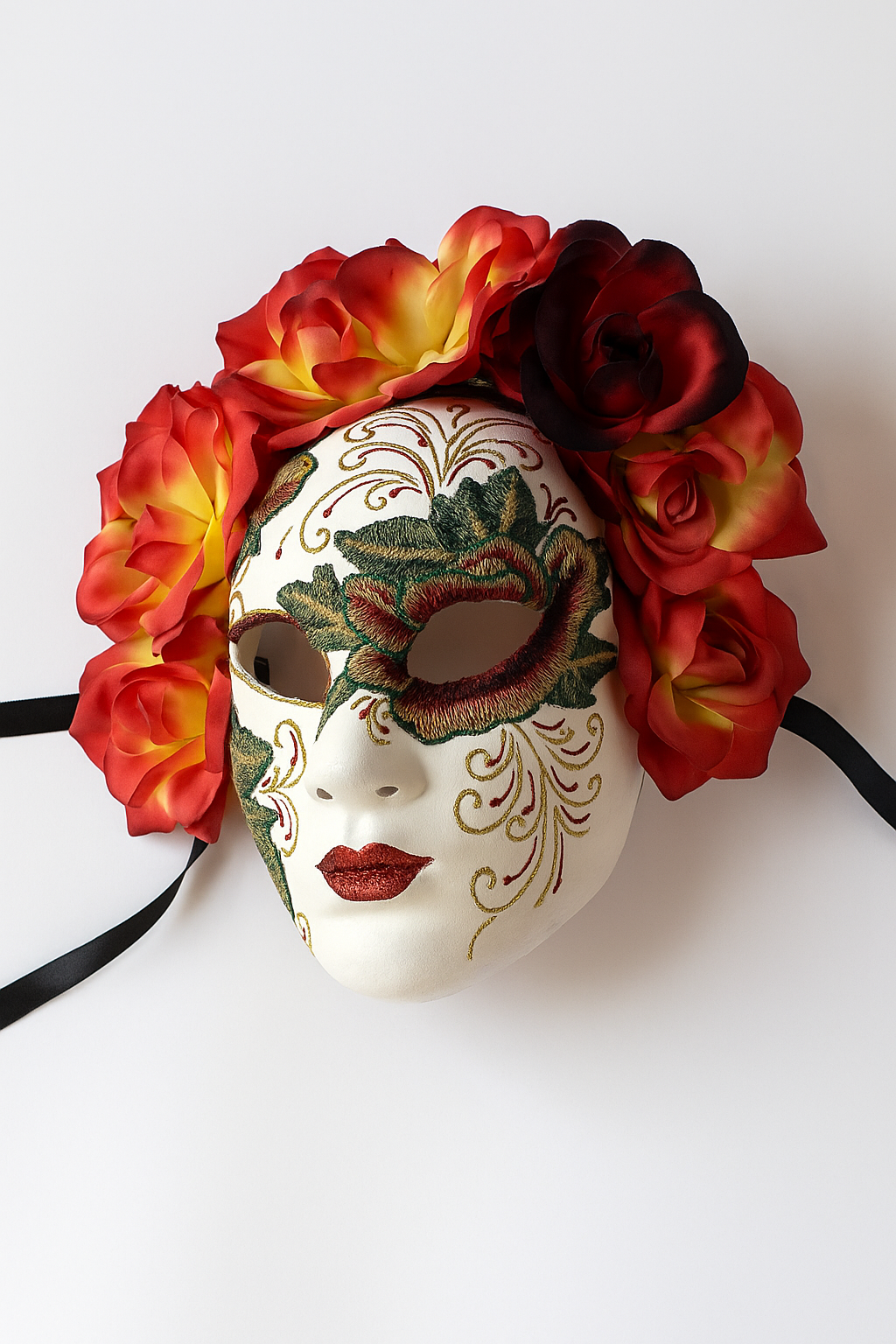 Red floral full-face sugar skull mask with embroidery and blossoms for Day of the Dead and masquerade events.