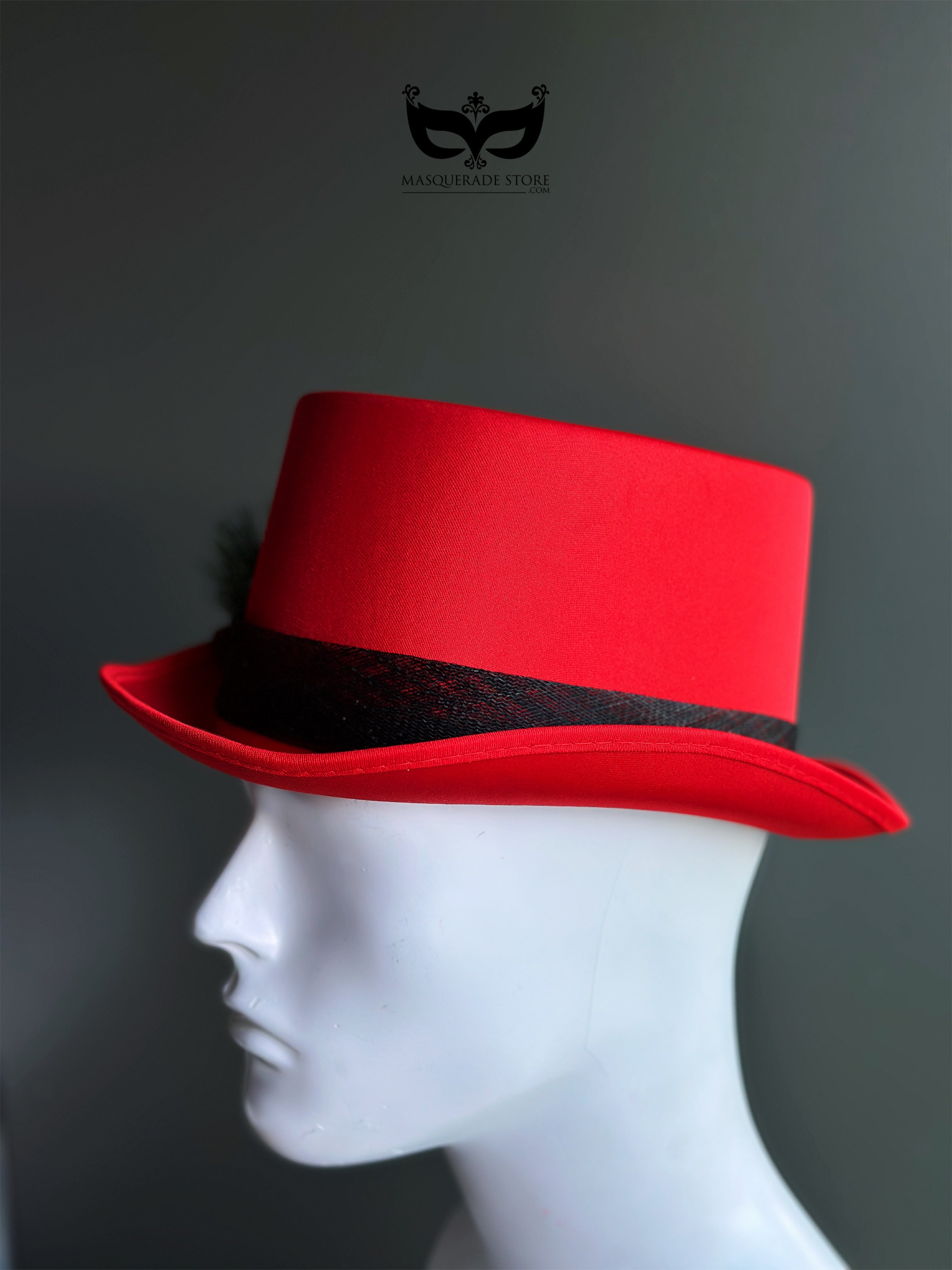 Red Christmas top hat with pine greenery pinecone accent for holiday outfits and winter parties