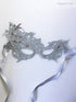 Elegant silver lace masquerade mask with red rhinestones, perfect for proms, formal galas, and Venetian masquerade parties.