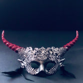 Silver and red gothic floral horn masquerade mask with black feathers