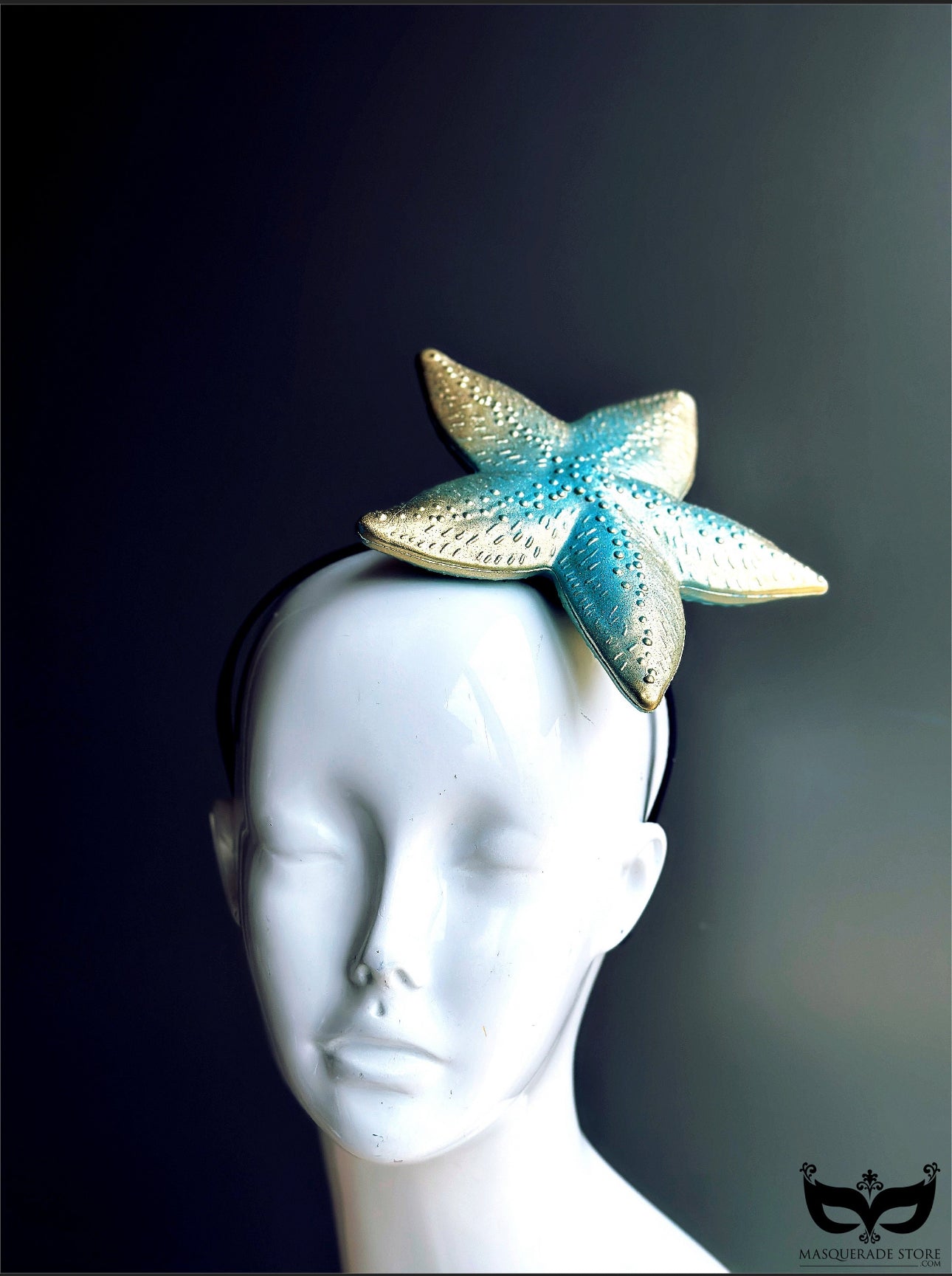 Gold and teal starfish fascinator on a headband, perfect for beach weddings, mermaid outfits, and ocean-themed events.