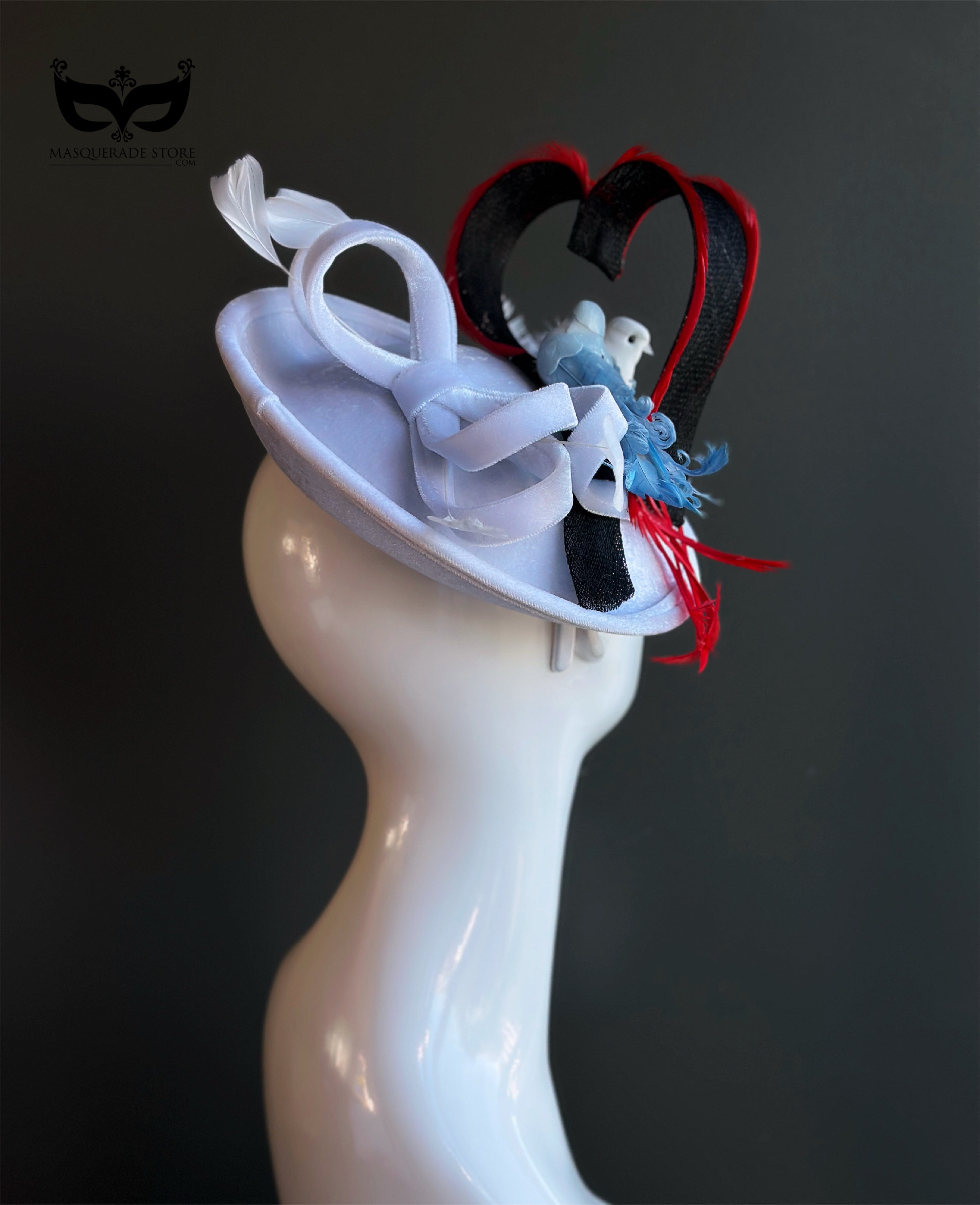 Love birds themed fascinator hat with feathers and red accents