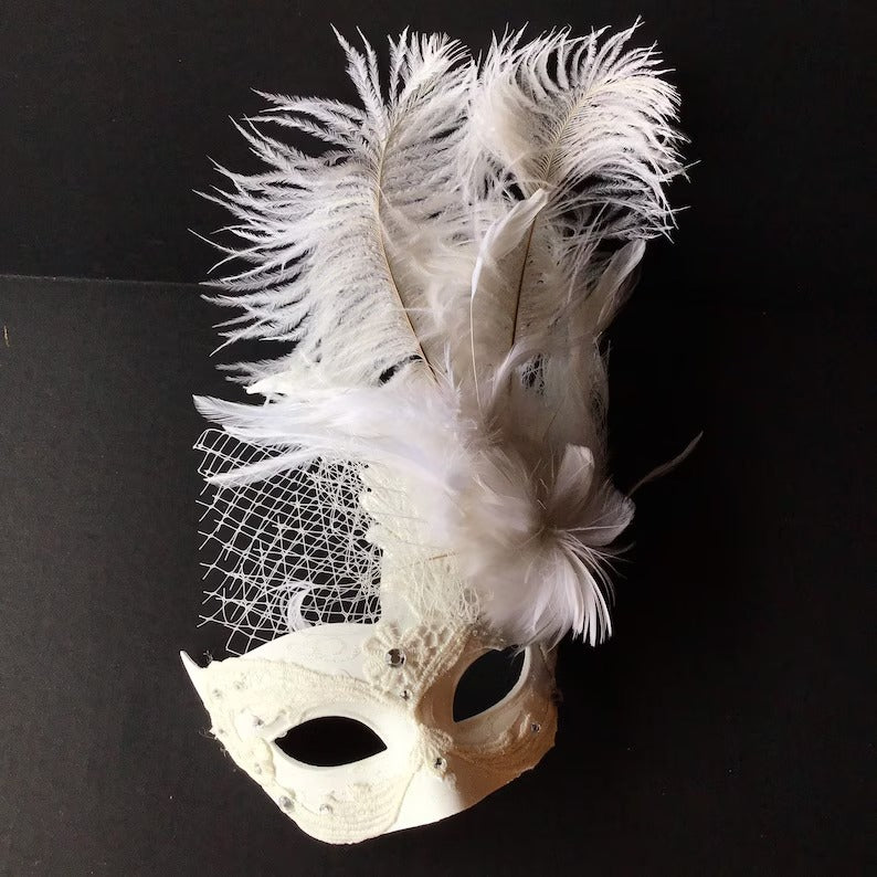 Elegant white masquerade mask with tall feather plume and netting accent, Venetian wedding and prom mask.