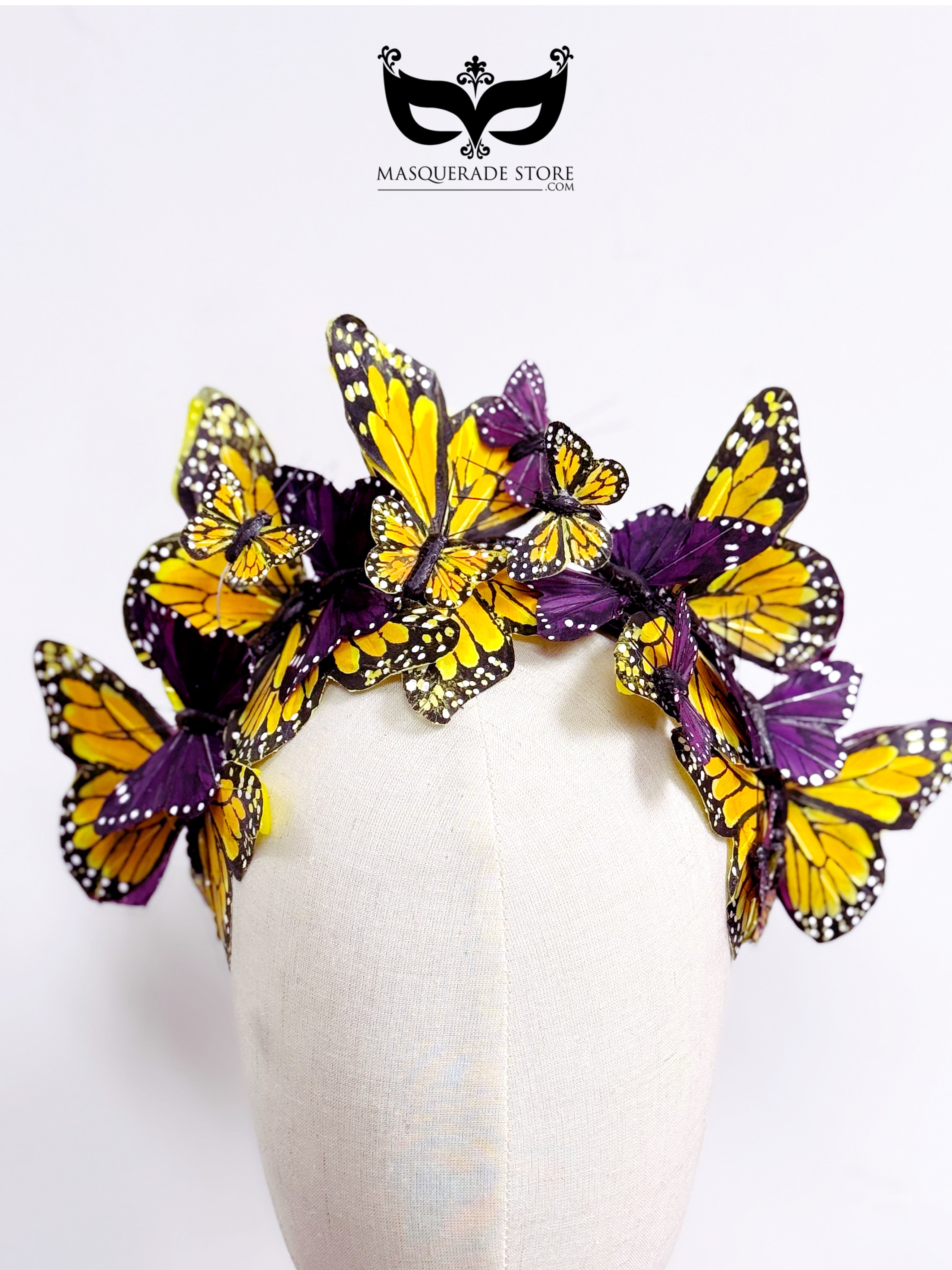 Yellow and purple butterfly headband with layered monarch style wings arranged in a curved crown design