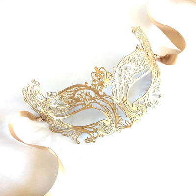 Kid's masquerade mask in gold metal with rhinestones.