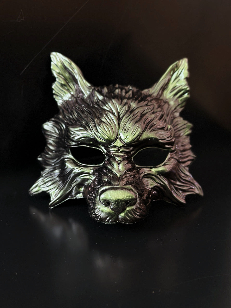 Antique gold and green wolf masquerade mask with sculpted details for costume and cosplay events.