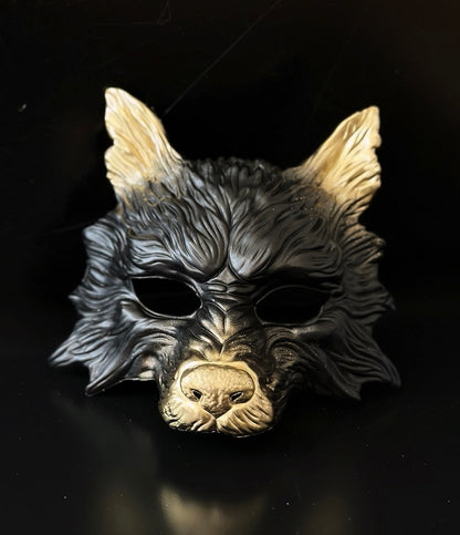 Black and antique gold wolf masquerade mask with detailed sculpted design for costume and cosplay events.