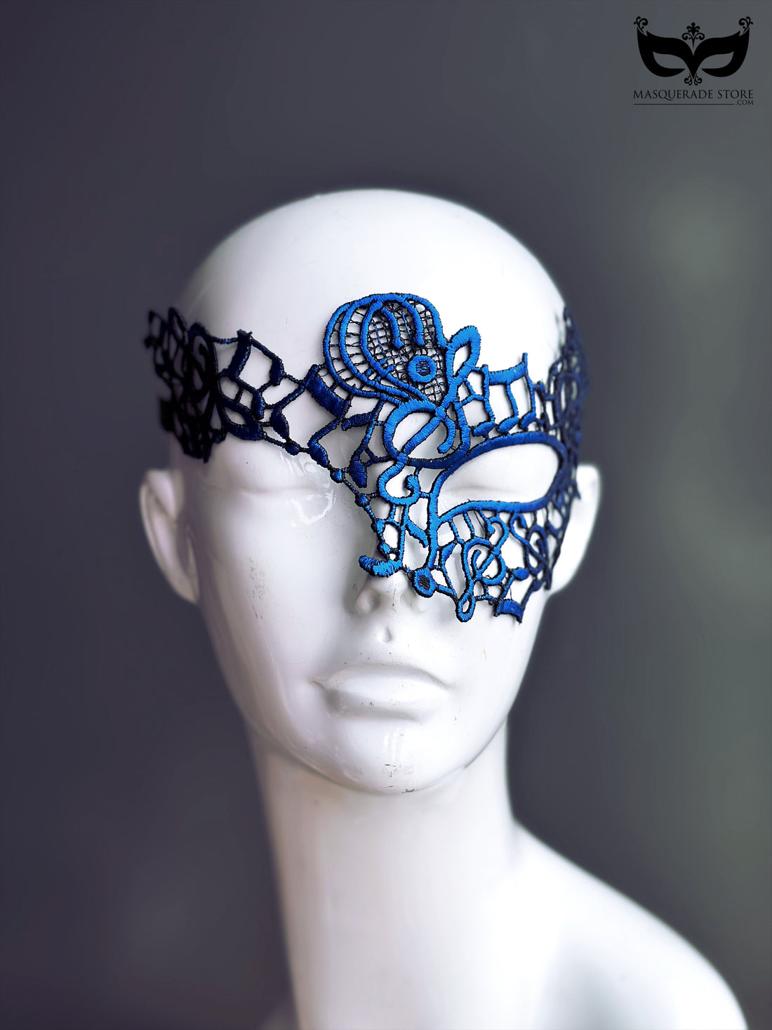 Black and blue lace masquerade mask with gothic detailing for women’s masquerade ball, prom, or Halloween party.