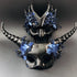 Elegant black masquerade couples mask duo with dramatic blue flowers and fantasy horn detailing.

