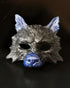 Black and blue wolf masquerade mask with sculpted details for costume and cosplay events.