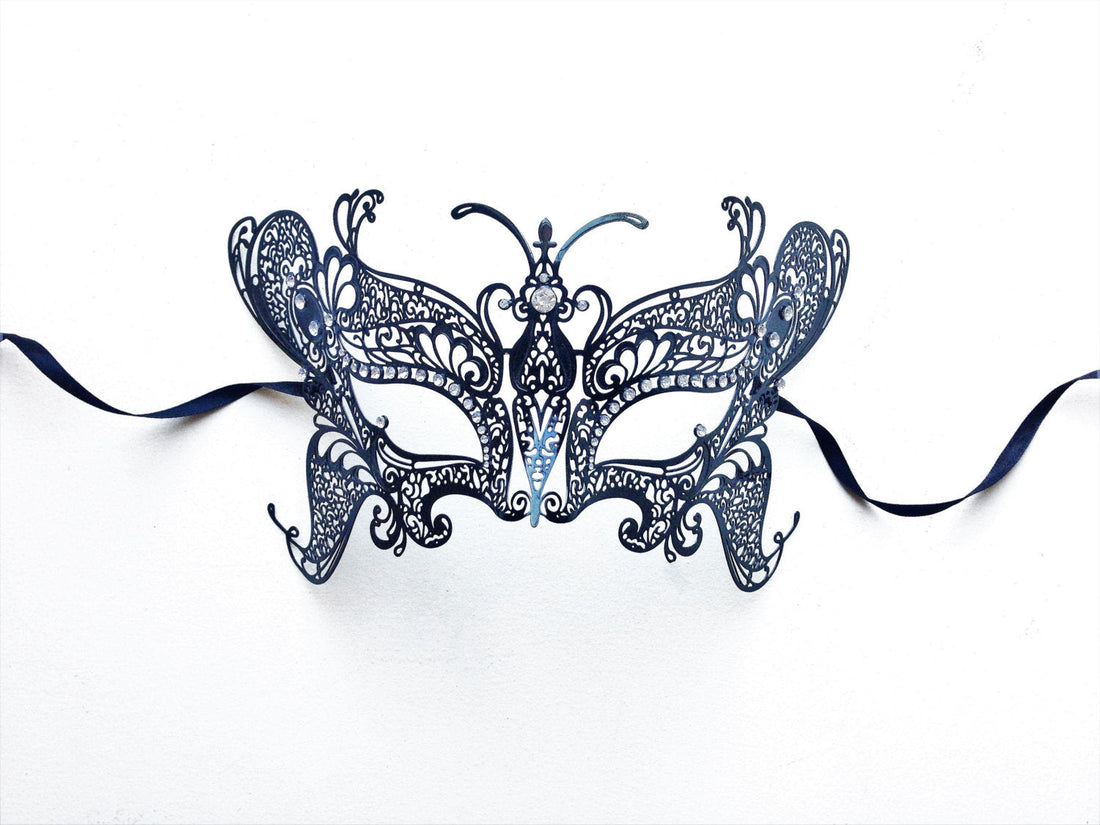 Elegant black filigree butterfly mask with satin ribbon ties for costume events