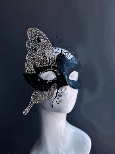 Women's butterfly masquerade mask with shimmer and rhinestones.