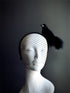 Black crow fascinator with mesh veil for gothic masquerade, witch costume, or Halloween outfit