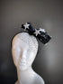 Elegant black fascinator with silver glitter stars and veil—great for evening events, galas, or themed parties.
