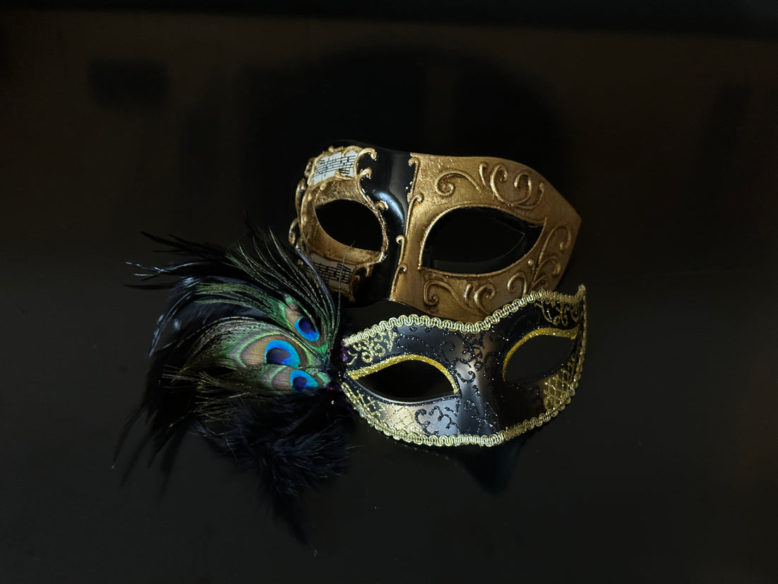 Elegant black and gold masquerade couple&