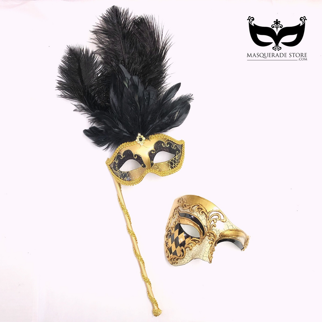 Black and gold masquerade couple’s mask set with a feathered women’s stick mask and a men’s harlequin scroll mask.