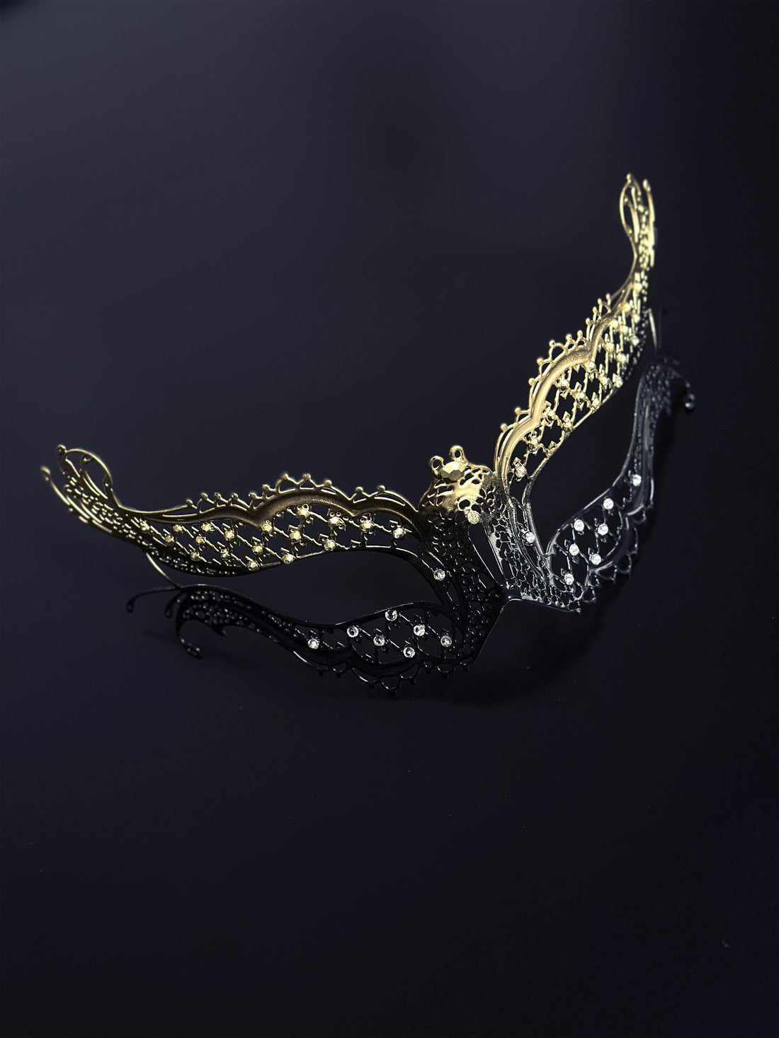 Black and gold metal masquerade mask with lace cutouts and rhinestone accents, perfect for women’s masquerade balls and Venetian parties.