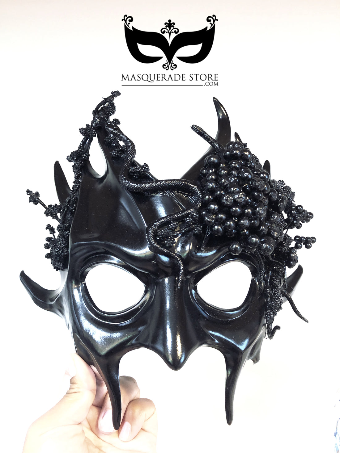 Black horned masquerade mask with spikes and gothic snake details for Halloween and dark fantasy cosplay.