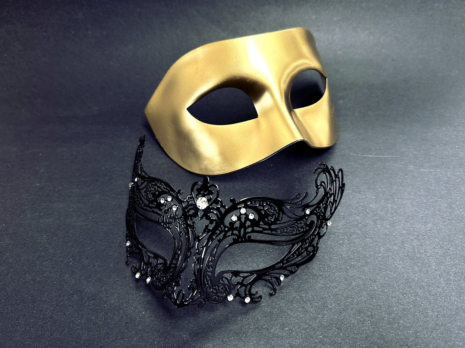 Elegant gold and black couples masquerade masks with crystal details, perfect for masquerade balls, prom, and Halloween.