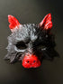 Black and red wolf masquerade mask with sculpted details for costume and cosplay events.