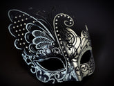 Elegant masquerade mask in butterfly shape with silver and black detailing, ideal for fantasy balls
