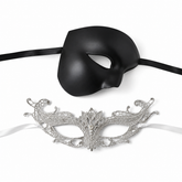 Black silver couples masquerade mask set with smooth black phantom-style men’s mask and ornate silver lace women’s mask for gala and formal events.