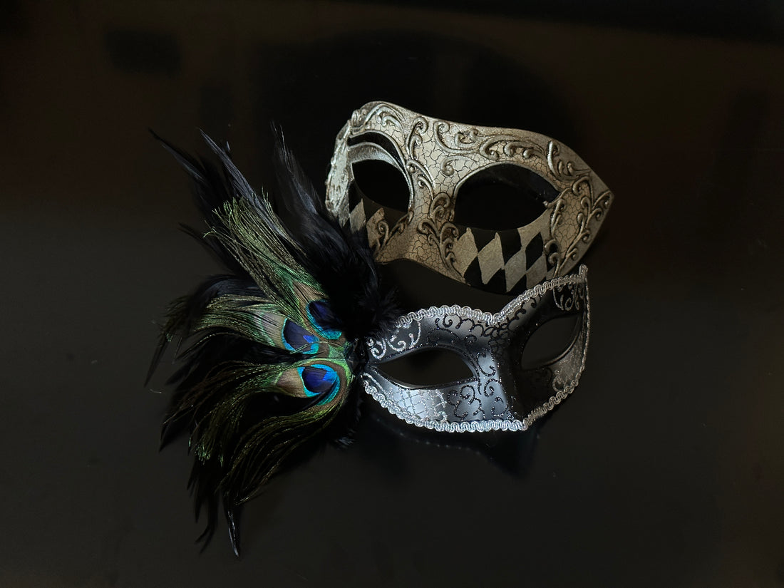Black and silver masquerade mask set for couples with peacock feathers and harlequin pattern, perfect for elegant costume events.