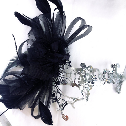 Black and silver women masquerade masks with feathers, rhinestones, and elegant Venetian details.