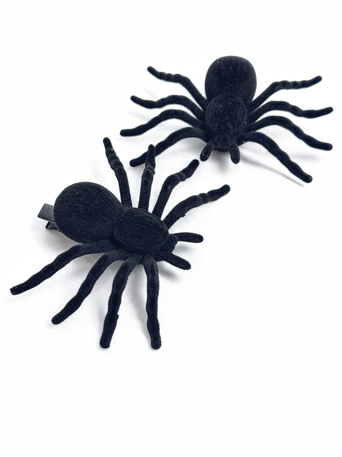 Black velvet spider hair clips for Halloween costume or spooky hairstyle
