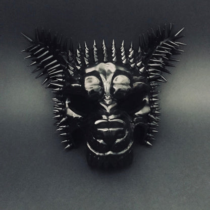 Gothic wolf masquerade mask with spikes and dramatic black details.

