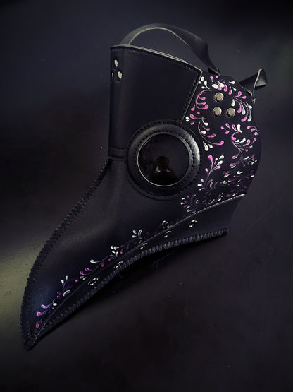 Black plague mask with pink silver filigree for sale.
