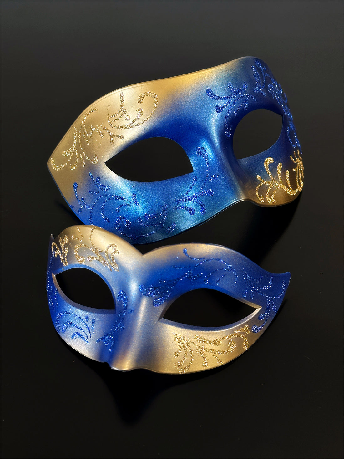 Blue and gold glitter masquerade masks for couples with ombré design
