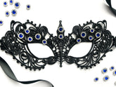 Black lace masquerade mask with sapphire blue rhinestones for gala parties and Venetian formal events.
