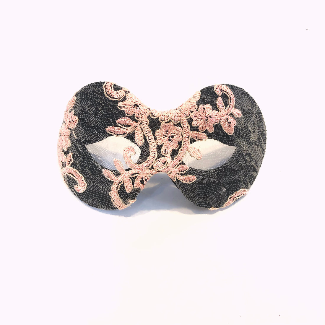 Black masquerade mask with blush pink lace embroidery and floral design.
