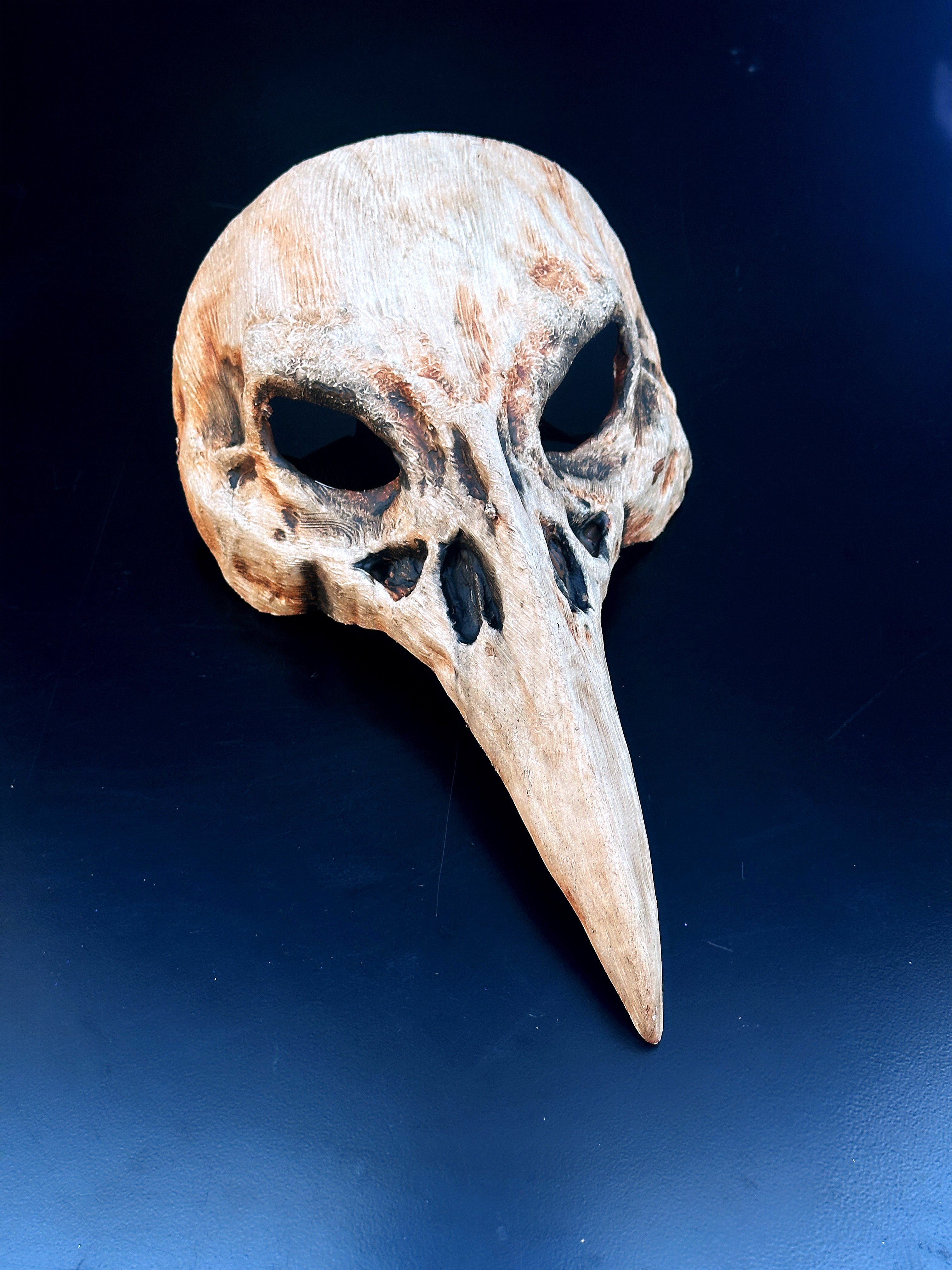 Bone-textured plague doctor skull mask with long beak design for Halloween, gothic cosplay, or Venetian masquerade.
