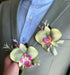 Sage green orchid boutonniere and corsage set for weddings, prom, and garden formal events.