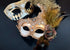 Ornate couples masquerade masks in bronze and black with fall-inspired details