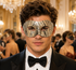 Bronze Gold Shroud men’s masquerade mask with raised diagonal stripe texture, distressed bronze-gold metallic finish, almond eye openings, and ribbon ties.