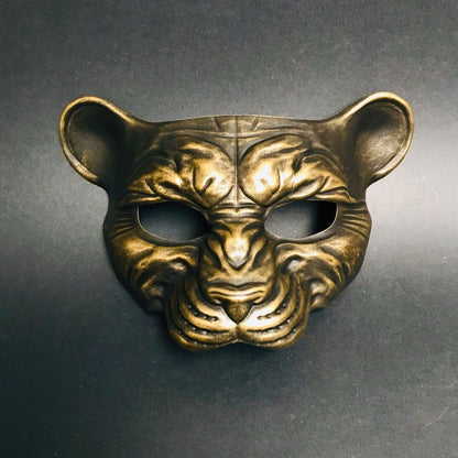  Antique bronze masquerade mask shaped like a panther, perfect for wild masquerade balls or cosplay events.